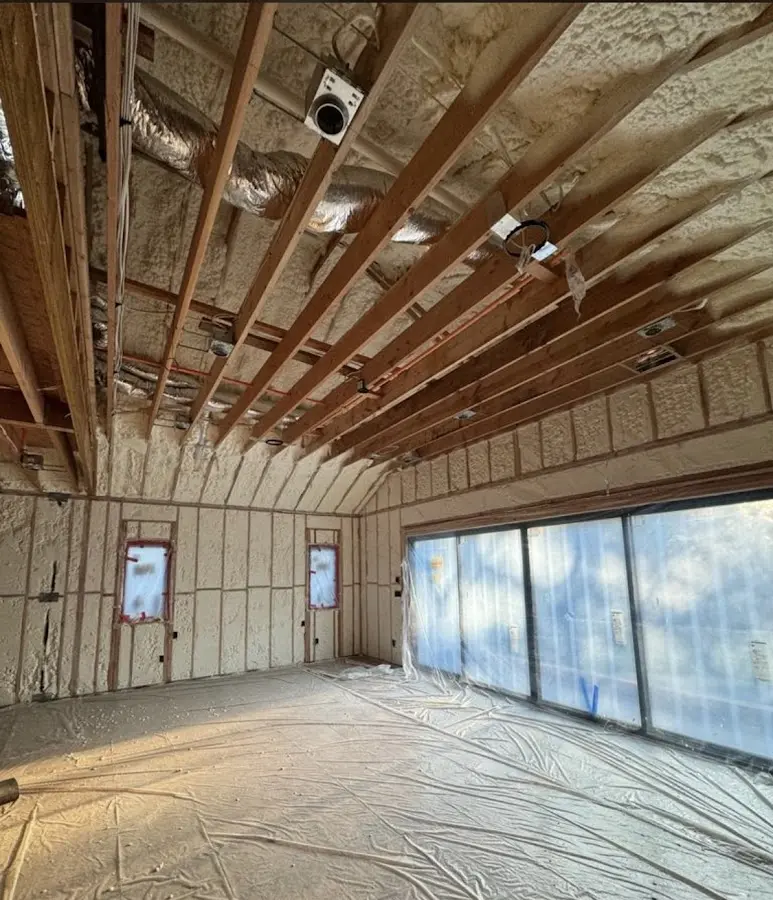 Interior walls and ceiling insulated with spray foam during new construction in Parker